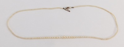 A single strand cultured pearl necklace, with a white gold clasp stamped 9c, the beads graduated, 43cm long, 3.5g all in.