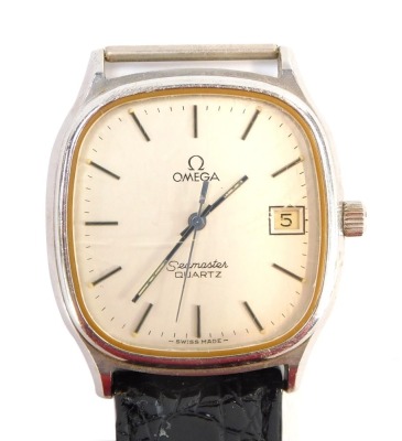 An Omega Seamaster gentleman's wristwatch, in a stainless steel case, with Seamaster motif, part black leather strap, with date aperture, the dial 3cm diameter.