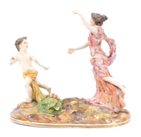 A late 19thC porcelain figure group of a lady chasing child, on a circular base, numbered to underside 217, restored, 21cm high, 24cm wide.