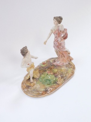 A late 19thC porcelain figure group of a lady chasing child, on a circular base, numbered to underside 217, restored, 21cm high, 24cm wide. - 2