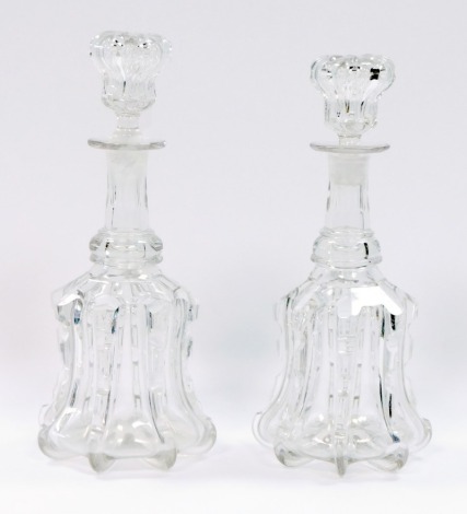 A pair of 19thC cut glass mallet shaped decanters, each with an applied and fluted ribbing, 31cm high.