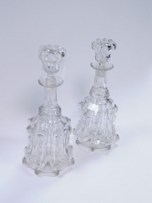 A pair of 19thC cut glass mallet shaped decanters, each with an applied and fluted ribbing, 31cm high. - 2