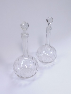 A pair of late 19thC balloon decanters, each with a faceted stopper, on plain design stem with cut oval body, 25cm high. - 2