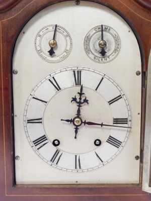 A late 19thC mahogany cased mantel clock, with arch top dial and silvered numeric chapter ring, the twenty one day movement with chiming mechanism, terminating in brass bracket feet, 35cm high, 25cm wide, 17cm deep. - 2