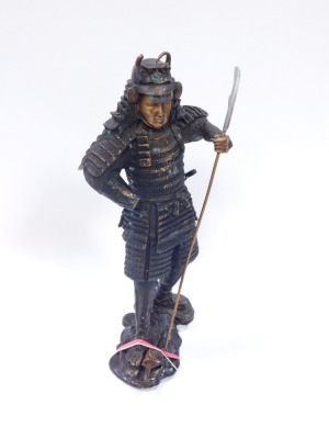 A bronze figure of a warrior, in Eastern design, with layered armour and weapon, 43cm high. (AF) - 2