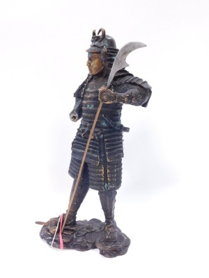 A bronze figure of a warrior, in Eastern design, with layered armour and weapon, 43cm high. (AF) - 3