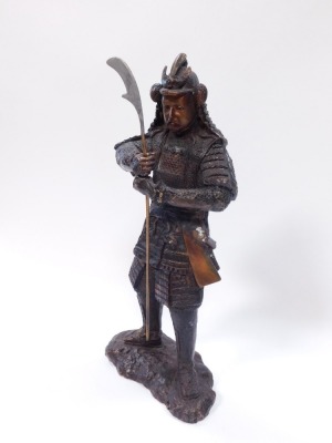 A bronze figure of a warrior, in Eastern design, with layered armour and weapon, 43cm high. - 3