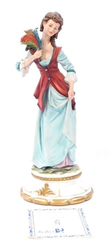 A Capodimonte figure of Josephine, with certificate and purchase receipt from 1981, 33cm high.