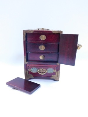 A Chinese hardwood and jadeite table jewellery cabinet, with two doors opening to reveal three drawers above a further drawer raised on bracket feet, 24cm high, 17cm wide, 13.5cm deep. (AF) - 4