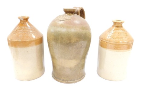 Three stoneware bottles, comprising an H Smith of Doncaster, .20 Ale, No 386, a Doulton Lambeth J S Williams & Son of London stoneware bottle, and a John W M Peak of Gosberton bottle, 41cm and 35cm high. (3)