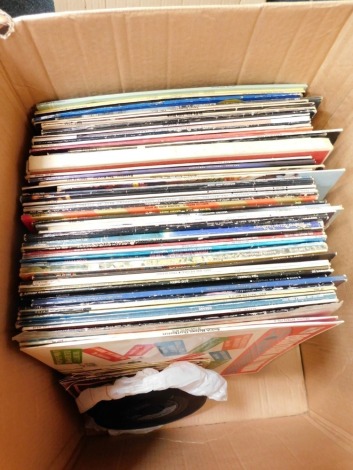 A group of 45rpm and 33rpm records, to include Stevie Wonder, AC/DC, Grease, Elvis's Golden Records, Tina Turner, Eddie Cochrane, T-Rex, Hot Chocolate, Barbara Streisand, Ultravox, Motown, Beach Boys, Boney M, The Nolans, Bob Marley, The Bee-Gees, Gary Gl