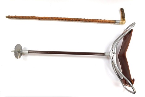 A shooting stick, 84cm high, and a silver collared walking cane, with horn handle and turned wooden pole, 82cm high. (2)