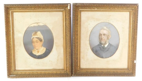 20thC School. A pair of quarter profile portraits of a lady and gentleman, oil on photographic image, unsigned, in oval mounting, 30cm x 25cm, in ornate gilt frames. (2)