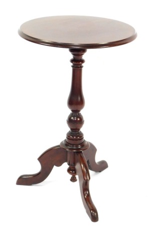 A 19thC mahogany wine table, with circular top on tripod base, 71cm high, 46cm diameter.