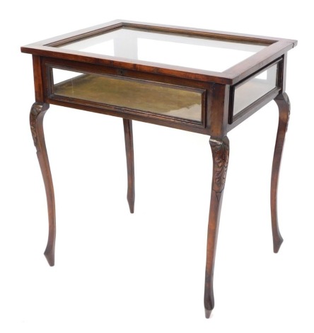 An early 20thC mahogany display table, with a green plush velvet inlay, on cabriole out splayed legs, with rectangular top 82cm high, 75cm wide, 55cm deep.