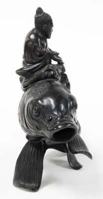 A Japanese Meiji period bronze vessel and cover, shaped as the figure of Kinko holding a book or scroll (now missing) riding a carp, 19cm high. - 2