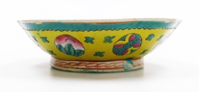 A Japanese porcelain bowl, the interior decorated with bird on flowering branch against a yellow ground, within a blue and white border, signed on the underside, 19cm wide, and a Chinese pottery dish, with turquoise glaze to interior and the exterior deco - 5