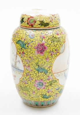 A Chinese famille jaune jar and cover, the front and back panels decorated with figures in a garden, four character stencilled read Qianling seal to underside, 21cm high, and two celadon ground Canton dishes, decorated with birds and flowers, 15cm diamete - 3