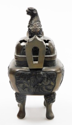 A Chinese bronze koro and cover, on four feet, the body decorated with four reserves depicting figures and animal, the pierced lid with dog of fo finial, 25cm high. - 2