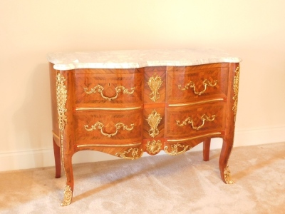 A 20thC kingwood parquetry commode, with marble top, gilt brass adornments to the two drawer front apron and legs, 89cm high, 125cm wide 50cm deep. Provenance: Upon instructions from the executors of Mrs Sandra Mapletoft (Dec'd) who purchased this as Lot - 11