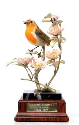 An Albany Fine China Robin ornament, on a marble plinth on wooden base, with plaque 'H M Queen Elizabeth II Silver Jubilee 1952-1977', limited edition 9 underside, 31cm high. - 9