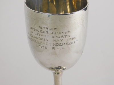 A George VI silver goblet, with inverted stem and circular foot, marked First Prize Officers Jumping Military Sports...May 1916, London 1914, 18cm high, 4.3oz. - 2