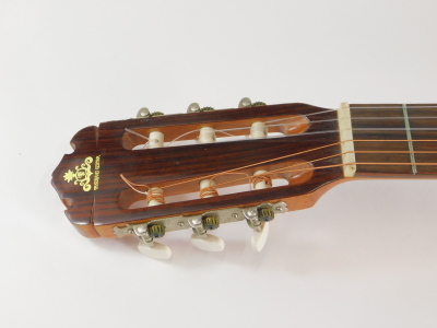 A 20thC Japanese Takeharu acoustic guitar, model GT-85 numbered 80462 with Kiso Suzuki Violin Co label, 98cm long. - 2