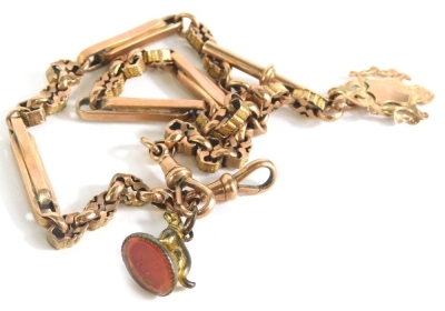 A fancy link double Albert watch chain, centred by T-bar, with outer clasp marked 9C, 39cm long, attached to a 9ct gold fob and small dog head seal.