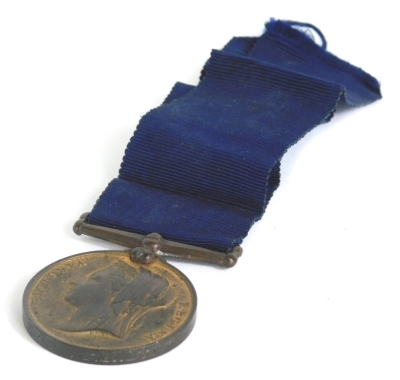 A Victorian Metropolitan Police medal, Jubilee 1887, marked FS T Oakey R DIV, with blue ribbon.