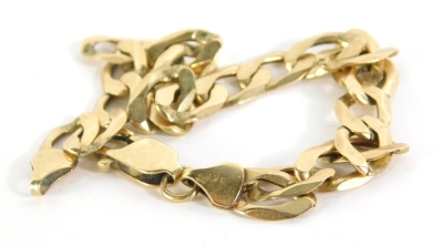 A heavy link bracelet, marked 9KT, 22cm long, 13.2g.