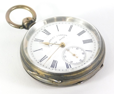 An early 20thC open faced pocket watch, the engine turned case with vacant cartouche, marked 0935, with 12cm diameter Roman numeric dial and subsidiary Arabic second hand.