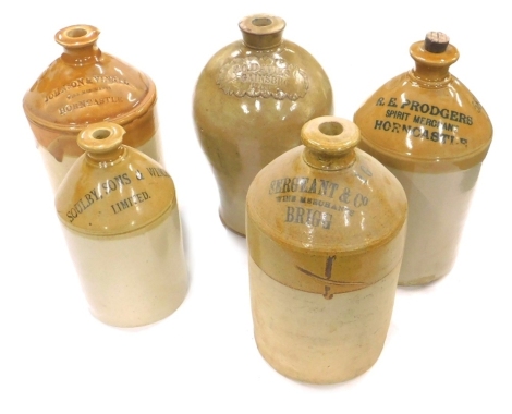 Various stoneware jars, one marked RE Prodgeers, numbered 583, with cork stopper, 38cm high, another Saulby Son and Winch Limited, Sergeant and Co Wine Merchants Brigg, another impressed Johnson and Vinall Wine Merchants Horncastle, and another with raise