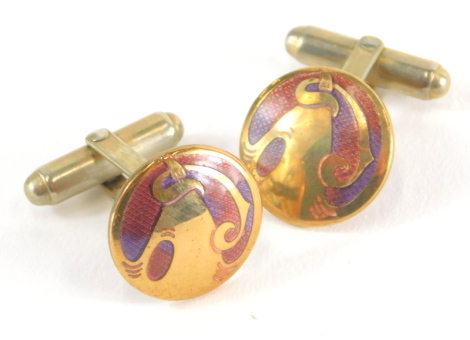 A pair of Liberty cufflinks, each with raised circular bases with pink and purple enamel, stamped Liberty to underside, 15cm wide, plated.