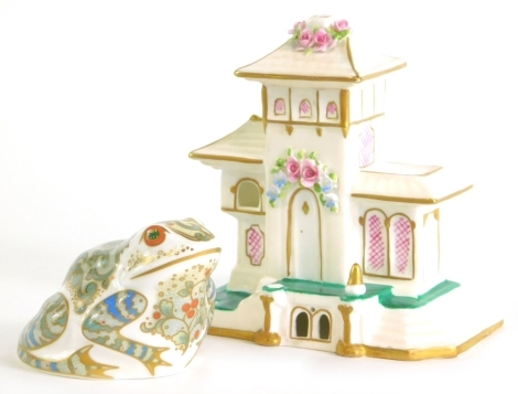 A Royal Crown Derby paperweight ornament frog, silver stopper, 6cm high, and a Coalport cottage The Villa, printed marks beneath. (2)