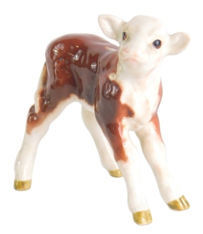 A Beswick Hereford calf, printed marks beneath, 8cm high.