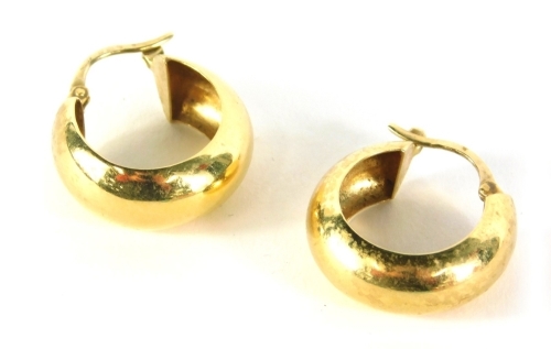 A pair of 9ct gold hoop earrings, of plain design, 3.9g all in.