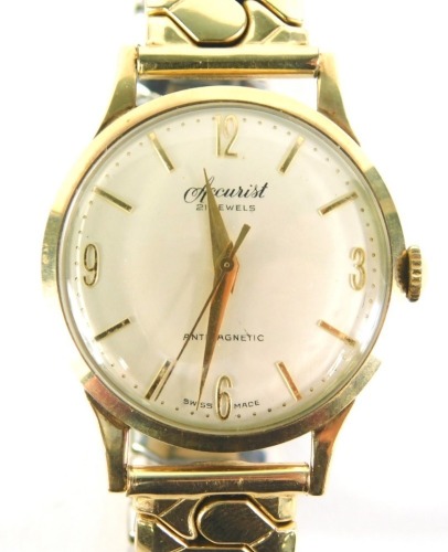 An Accurist 9ct gold cased gents wristwatch, with silvered numeric dial, 3cm diameter, on an expanding gold plated and stainless steel strap, 45g all in.