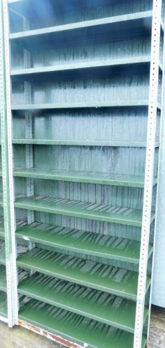 A set of vintage free standing metal shop shelving racking, 98cm high, 89cm wide.