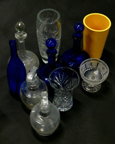 Various glassware, Bristol blue style pressed glass decanters, each of orb form with orb stoppers, 29cm high, a pair of further decanters with partial etched bodies and shaped stoppers, vase, other cut glassware, etc. (a quantity)