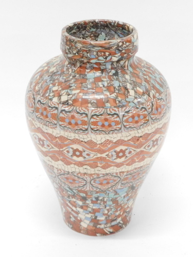 An agate ware studio pottery vase, with a marbled decoration, impressed marks beneath, 29cm high.