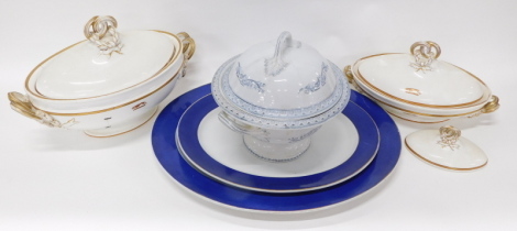 A 19thC Armorial meat plate of oval form, and another smaller, each with Spes Mea In Deo crest, and blue outline, 51cm wide, etc. And an early 20thC Cauldons tureen, of oval form with gilt highlights, etc. (a quantity)