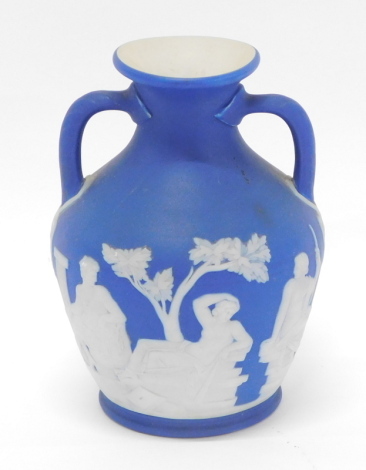 A 20thC Wedgwood blue Jasper miniature Portland vase, marked beneath, 14cm high. (AF)