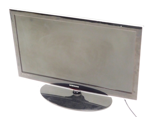 A Samsung 30'' television, with wire.