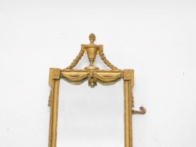 A gilt gesso rectangular wall mirror, decorated with urns, leaves, etc., in Adams style, 65cm high, 27cm wide. - 2