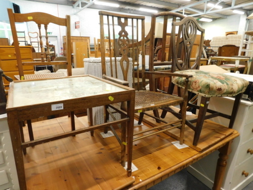 A mahogany coffee table with tapestry insert, an Edwardian beech open arm chair, and a 19thC mahogany dining chair. (3)