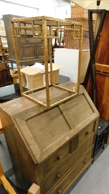 A gold and marble occasional table, oak bureau, standard lamp and a nest of three metal tables.