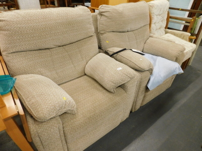 A pair of armchairs, one Being electric radiator upholstered in beige patterned fabric and a modern wingback chair. (3)