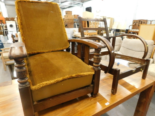 Two similar 1920/30's oak reclining armchairs, one lacking cushions, stamped The Ideal Bedchair R.F Ltd.