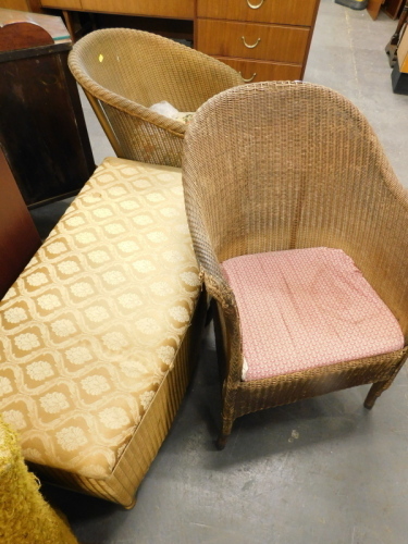 Two Lloyd Loom type chairs and a linen basket. (3)