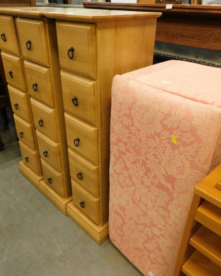 Three matching wood effect tall CD cabinets and an Ottoman.